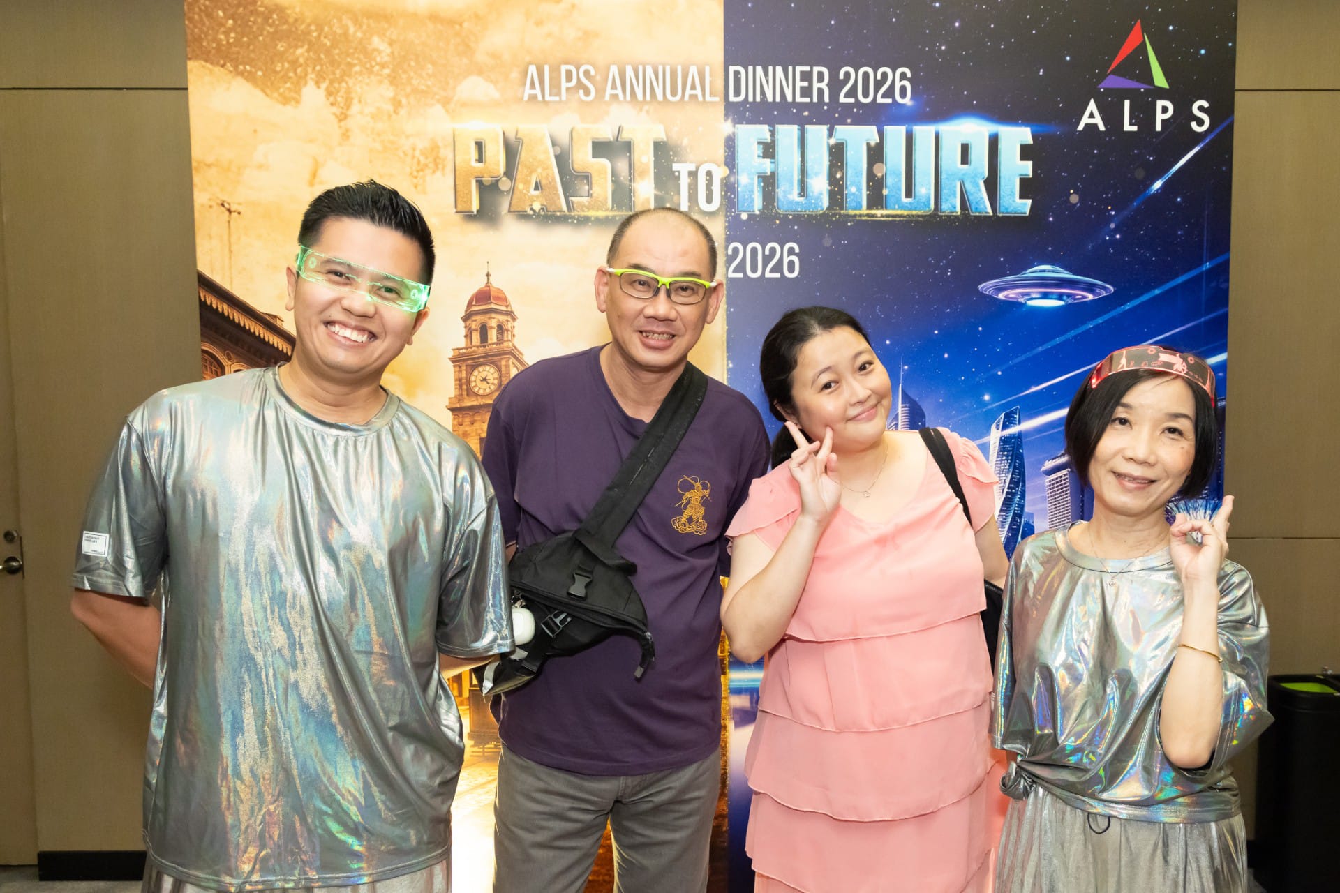 Photo of 4 ALPS staff taken at ALPS Anniversary Dinner